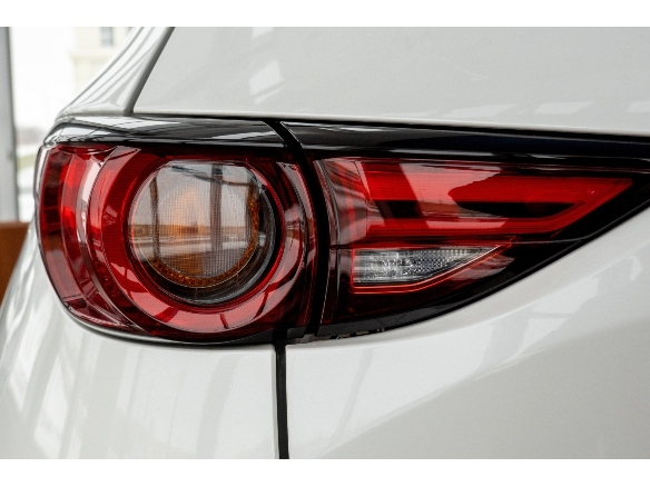rear light on vehicle showcasing plastic property in automotive industry